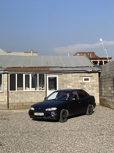 Другие автомобили: Седан компакт-класса, 4 двери, темно-фиолетовый цвет. Кузов с — 1