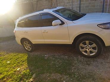 09 maşın: Hyundai Santa Fe: 2.2 l | 2009 il Universal — 2