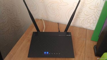 Модемы и сетевое оборудование: WiFi роутер ASUS RT-N12, скорость 300 Мбит, 1xWAN, 4xLAN, 2x антенны