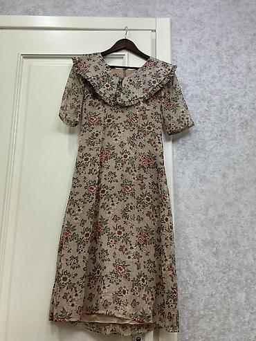 Vintage üslubda qadın paltarı - Model: A-kəsimli, dizdən aşağı