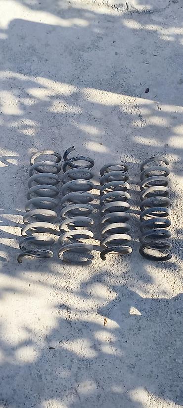 nolyedi sekilleri: Məhsul: Avtomobil üçün spiral yay dəsti Təsvir: - Şəkillərdə 4 ədəd — 2