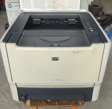 сколько стоит принтер для печати фотографий: HP LaserJet P2015dn, сетевой с двухсторонней печатью. Без кабелей