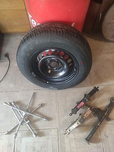 ucuz moto: Avtomobil üçün ehtiyat təkər və alət dəsti - Təkər: DUNLOP markalı — 1
