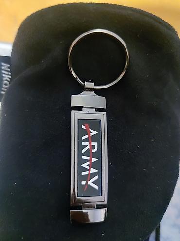 Breloklar: Metal açarlıq – “ARMY” yazılı - Material: Paslanmayan metal gövdə və — 1