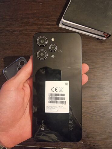 kreditle telefonlar: Xiaomi Redmi 12, 256 ГБ, цвет - Черный, 
 Гарантия, Сенсорный, Отпечаток пальца