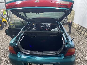 Mazda: Mazda 323: 1997 г., Механика, Бензин, Седан — 6