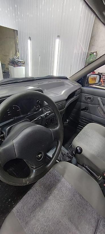 арзан машине: Daewoo Nexia: 2006 г., Кол менен иштөөчү, Бензин, Седан — 5