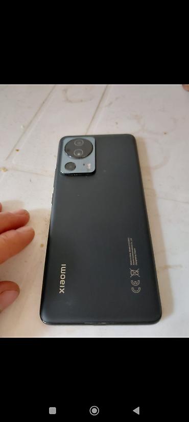 xiomi 14 lite: Xiaomi 13 Lite, 128 GB, rəng - Qara, 
 Face ID, Barmaq izi — 3