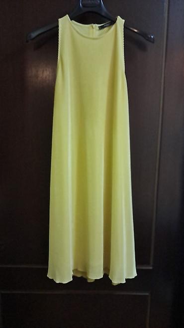 Donlar: Məhsul: Qadın geyimləri – 2 ədəd yay donu 1) Mango Basics sarı rəngli — 3