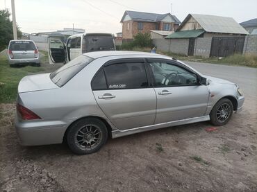 Mitsubishi: Mitsubishi Lancer: 2001 г., 1.5 л, Автомат, Бензин, Седан