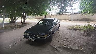 50 55: Mazda 626: 1990 г., Седан — 1
