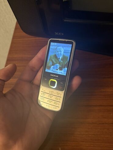 Аудиотехника: Nokia 6700 Slide, цвет - Серый, Кнопочный