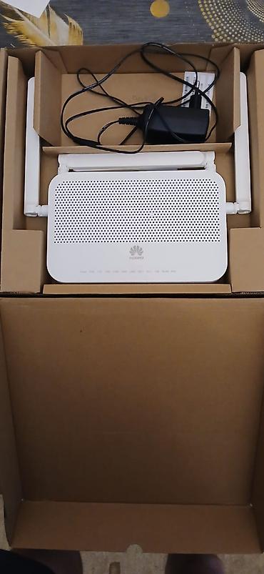 huaweı modem: Huawei optik internet modemi/routeru. Şəkillərdə görünən ağ rəngli — 2
