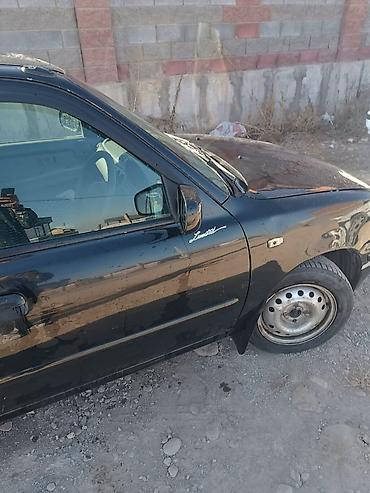 ka 3: Nissan March: 2001 г., 1.3 л, Автомат, Бензин, Хэтчбэк — 4