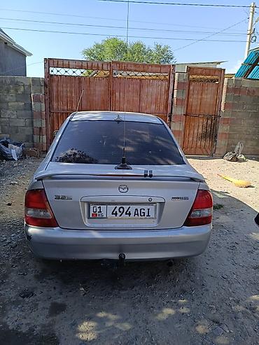 Mazda: Mazda 323: 2003 г., 1.6 л, Кол менен иштөөчү, Бензин, Седан — 1
