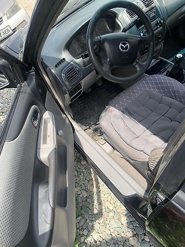 авто проект: Mazda 323: 2001 г., 1.6 л, Механика, Бензин, Хэтчбэк — 5
