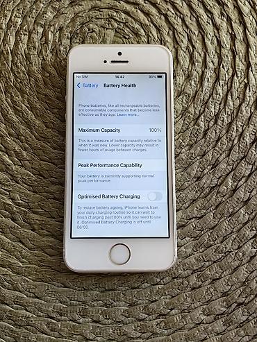 o bag: Iphone SE 2016 beli sa 64 gb memorije, otključan za sve mreže. Telefon — 5