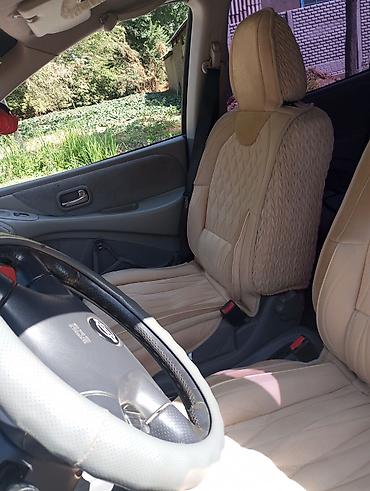банки amg: Nissan Almera Tino: 2001 г., 2 л, Газ — 6
