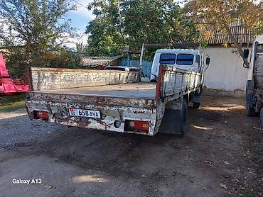 Услуги эвакуатора: Бортовой грузовик Hino Ranger (Atlas), длиннобазный длина борта 5-метр — 4