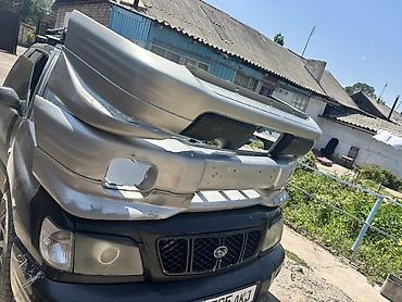 Бампер и комплектующие: Передний бампер для Subaru Forester SF (2002). Пара состоится хорошая — 6