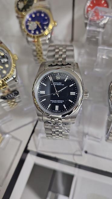rolex daydate: Məhsul: Kvars mexanizmli klassik kişilər üçün qol saatları (Rolex — 8