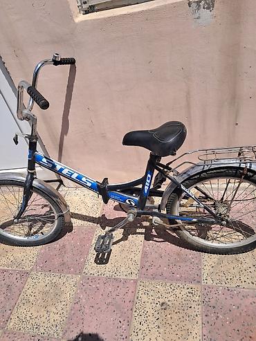 Velosipedlər: Uşaq velosipedi – STELS 410 Xüsusiyyətlər: - Ölçü: 20" təkərlər - — 1