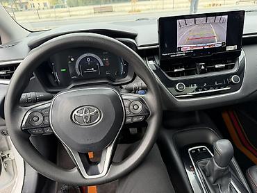 Продажа авто: Toyota Corolla: 2023 г., 1.8 л, Вариатор, Гибрид, Седан — 10