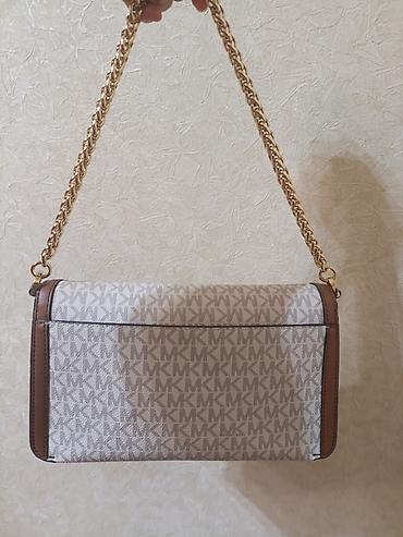 Çantalar: Michael kors çanta satılır.
originaldı.
2 defe tutulub.
teze kimidi — 2