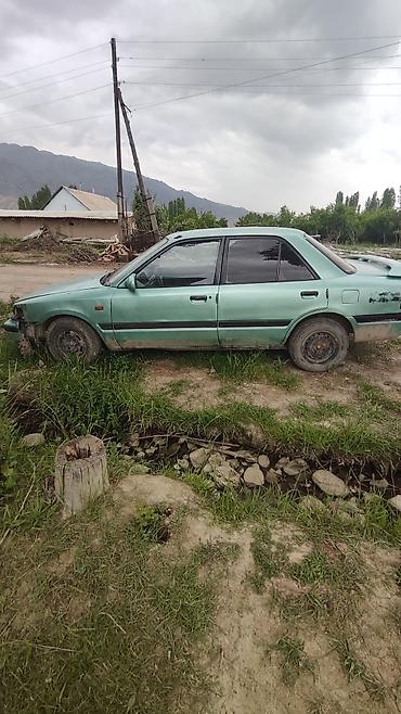 neta ls: Mazda 323: 1989 г., Седан — 4