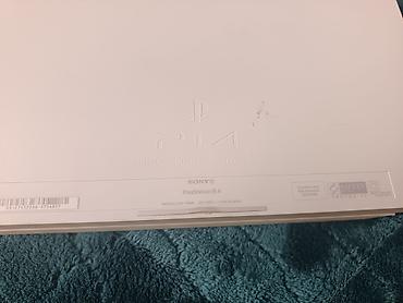 ophone 4: Sony PlayStation 4 (ağ rəng) – CUH-1106A model Xüsusiyyətlər: - Rəng — 2