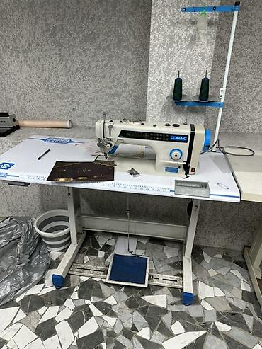 стол швейный: 2 прямо строчки и четырёхнитка всё вместе 25 тыс Нитки и масло, лампа — 2