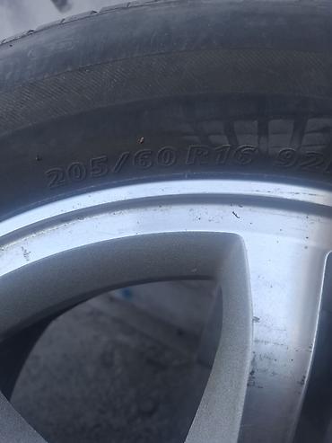 aeolus e70: Литой диск Honda с шиной 205/60 R16 - Оригинальный литой диск Honda — 2