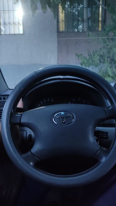 расрочка машина бишкек: Представленный автомобиль - седан Toyota Camry голубого цвета. Модель