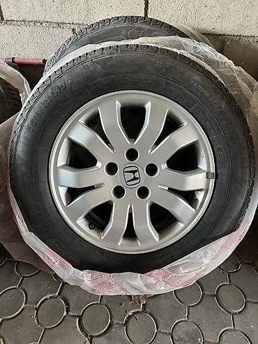 титан моноблок: Комплект из 4 легкосплавных дисков Honda с зимними шинами. - — 2