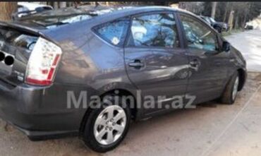 Kia: Toyota Prius (XW20) hibrid hetçbek - Kuzov: 5 qapılı hetçbek, tünd