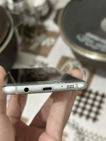 s 4 mini: Samsung Galaxy S7, Б/у, 32 ГБ, цвет - Серебристый, 2 SIM — 9