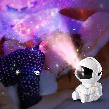 Rasveta: ASTRONAUT PROJEKTOR VECI MODEL NOV GALAKSIJA ZVEZDANO NEBO | Cene — 21