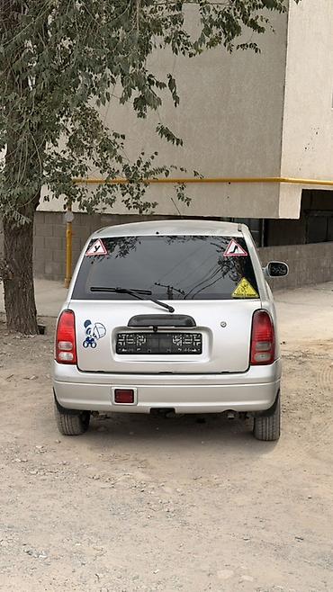 byd e1: Daihatsu Cuore: 2001 г., 1 л, Автомат, Бензин, Купе — 2