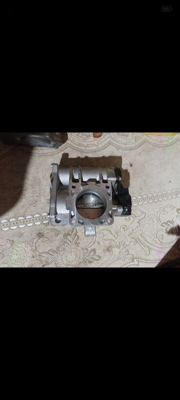 Системы охлаждения и нагревания: Elektron qaz paylayıcı klapan (throttle body) - Material: alüminium