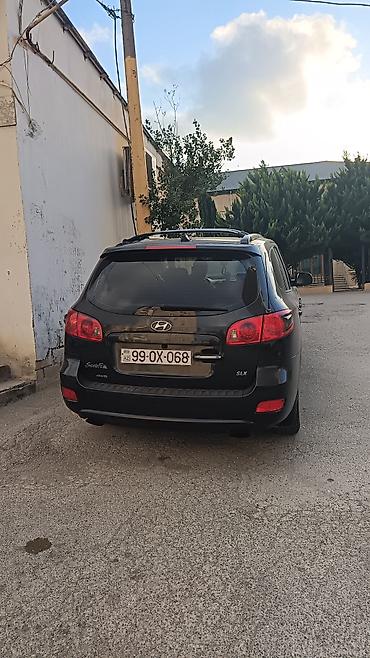 diffuser satisi: Hyundai Santa Fe: 2.2 l | 2006 il Krossover — 2