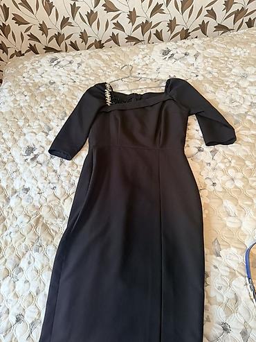 Tikilmə modeldi qaləm ətək eyinde oturusu cox gözeldi 38-40 razmere