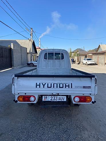 1000: Hyundai Porter II бортовой малотоннажный грузовик - Компоновка — 6