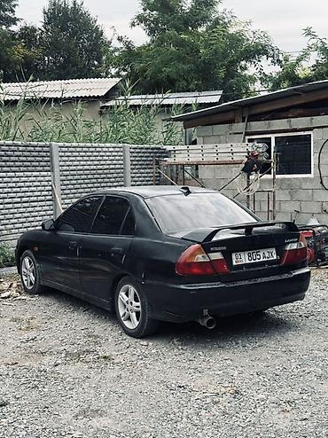 Mitsubishi Lancer: 1997 г., 1.5 л, Механика, Бензин, Седан