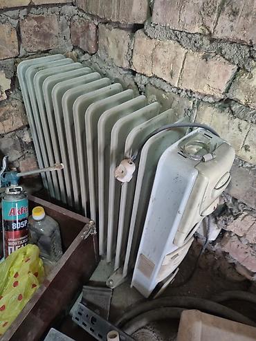 масленный радиатор: Масляный обогреватель Кол-во секций: 10 и более, Встроенный вентилятор — 1