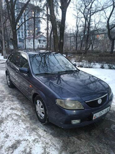 Mazda: Mazda 323: 2001 г., 1.6 л, Механика, Газ, Хэтчбэк