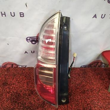 pass: Фонарь заднего хода левый для TOYOTA Passo (KGC10), год 2005. - — 1