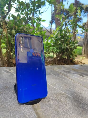 телефон флай еззи 7: Xiaomi Redmi 7, 64 ГБ, цвет - Синий, 
 Кнопочный, Отпечаток пальца, Face ID