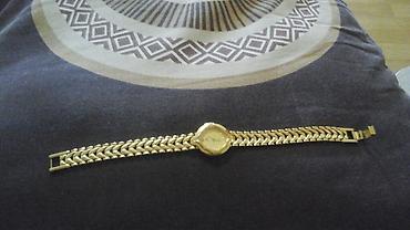 saat rado: 1990 ilde qizil saat kimi hediyye alinib. Uzun iller qolumda olub — 1