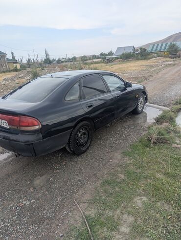 балон авто: Mazda Cronos: 1993 г., 1.8 л, Механика, Бензин, Хэтчбэк