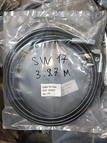 Рукав подъёма кабины (Cabin Tilt Hose) - OEM: 3988821 - Количество в